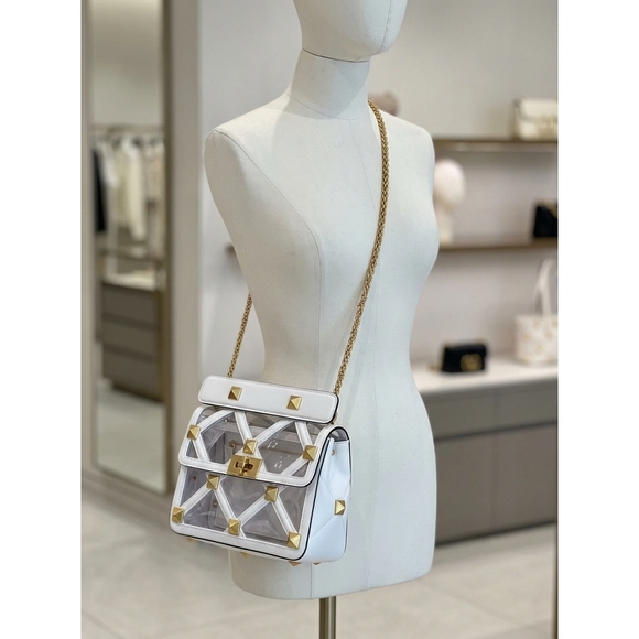 VALENTINO Handbags - NEW VALENTINO women's medium roman stud handbag in clear/white